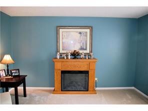 Living Room. Spacious 15x14 living room can also double as a home office, sitting area, play room, etc.  The free-standing fireplace is included!