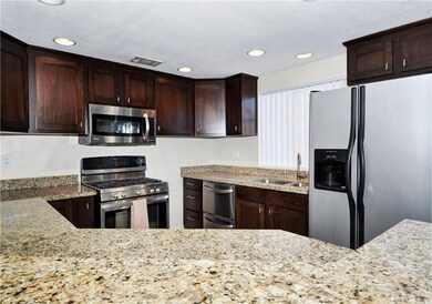 Added breakfast bar, stainless steel top-of-the-li
