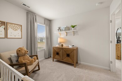 Picture is of a model in another community, not actual homesite
