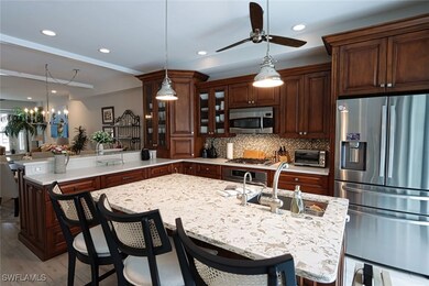 Kitchen with kitchen peninsula, appliances with st