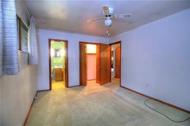 The master bedroom is in the rear of the home and