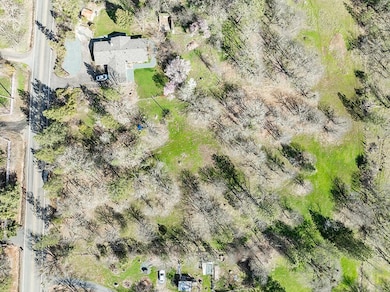 Mina Ln Directly above