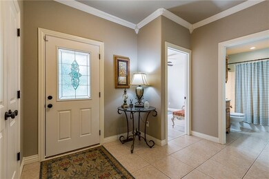The Foyer is open and the home is naturally bright! Note, a Double wide Coat closet.