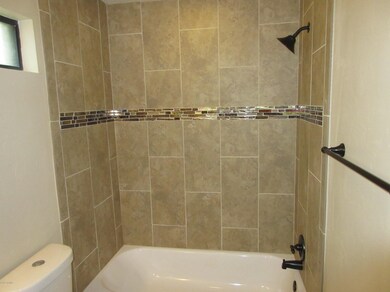 Ceramic Tile Surrounds in Guest Bathroom