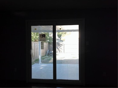 New sliding back door to the new covered patio