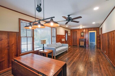 Dining open to living room.  Refinished original h