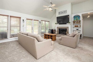 Great Room with lots of windows/light, vaulted cei