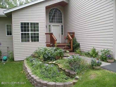 Front Door & Flower Gardens
