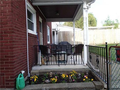 Exterior Back. Charming covered rear porch, a grea