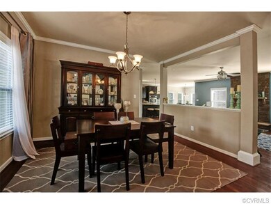 formal dining room with hardwood floors