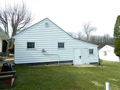 Parking Lot/Garage. Rear view of garage showing st
