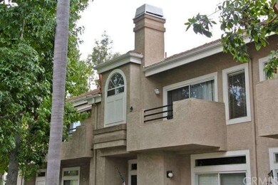 Soaring palms and other trees surround the condo, 