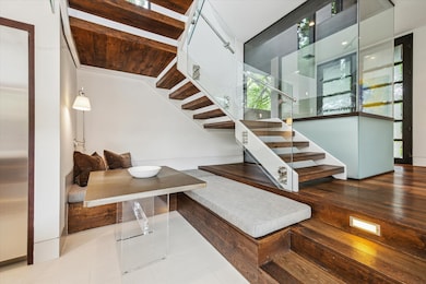Nestled beneath the staircase, a built-in breakfas