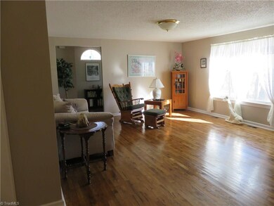 Front entry leads to large 19.2 x 15.8 living with refinished oak flooring