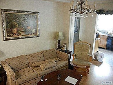 Living room has tile for easy cleaning.