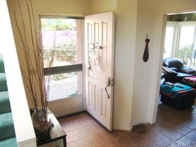 Front Entry - Stairs to left, den to right.