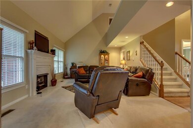 The open Great Room has soaring ceilings.
