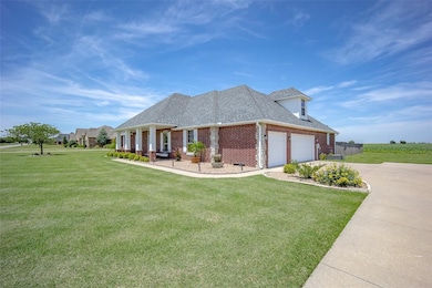 View of side of property featuring brick siding, r