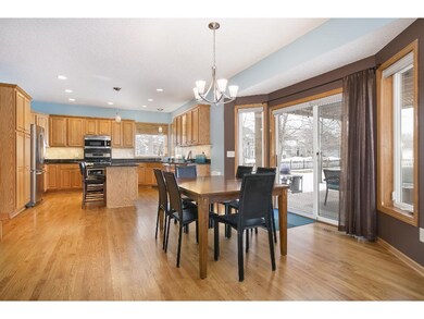 Informal dining area has patio doors that open to 