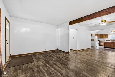 Living room. Invision relaxing on your couch along this wall and watching your favorite TV show on the TV in the right corner across from you.