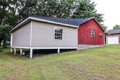 Lots of space for a She-Shed or Man-Cave!  104 Wind Curve Cir