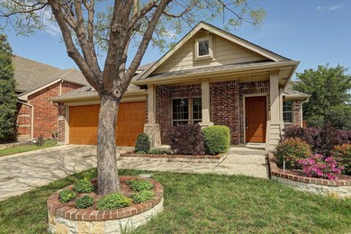 View of front facade featuring a garage and a fron