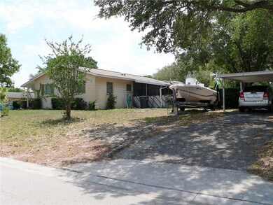 House Side with Carport