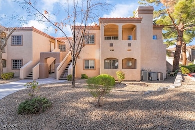 View of property featuring central AC and stairway