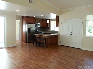 Double entry door leads you to high ceiling living