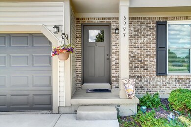 Welcome, come on in! Isn't the front door beautiful?!
