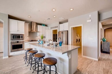 Kitchen overlooking great room: *Photo is of a mod
