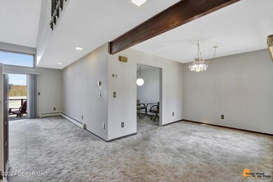 VIEW TO KITCHEN, DINING & LIVING ROOM