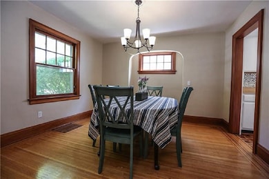 Spacious dining room, stunning Gum wood trim throu