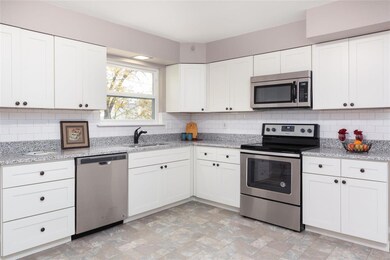 You'll also LOVE this Brand NEW Kitchen, complete with Light & Bright Custom Cabinets, New Granite tops, Subway Tile backsplash, New Stainless appliances, New Sink/Faucet and NEW Windows, looking out to the Private backyard!