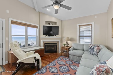 Open concept living room w/ fireplace