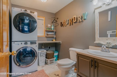 Laundry 1/2 Bathroom.