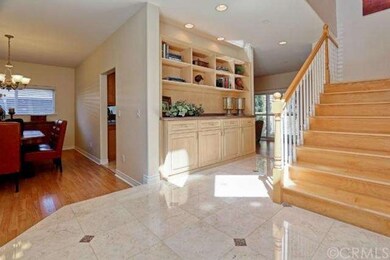 Entry with Built-in Cabinetry and Stone Floor