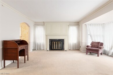 Large living room featuring a gas fireplace