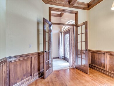 GLASS DOORS AT ENTRY OF HOME..