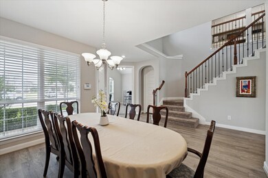 Upon entering the home, you'll find a formal dining area on your right and a private study with french doors on your left.