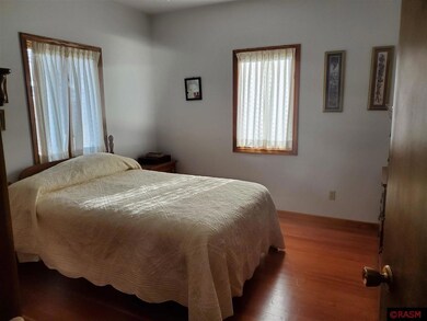 410 First Street N. One of Three Bedrooms