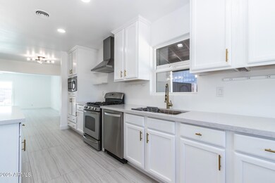kitchen flows into formal eating area