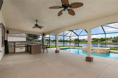 Back porch and patio with summer kitchen and pool/