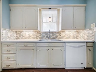 Kitchen View 1:  Newer, updated counter tops, back