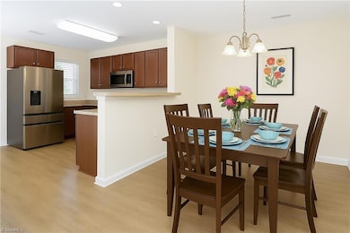Plenty of room in the dining  room, staged.
