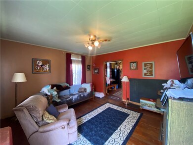 Living room with original wood floors.