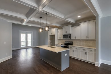 Pics are of the building next door. Floorplans are the same. Colors and finishes may vary. Finished pictures coming soon! 