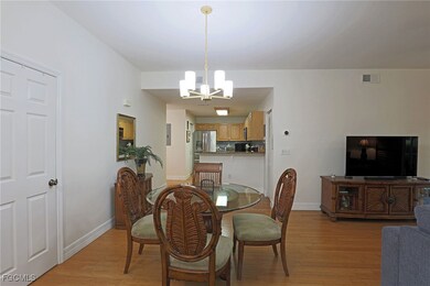 Dining room featuring a chandelier and light wood-style floors