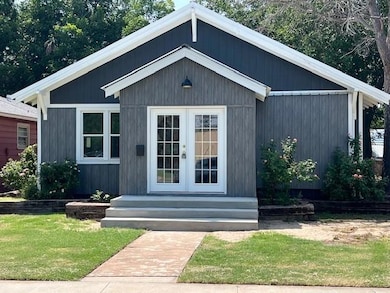 View of outdoor structure with french doors