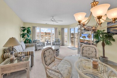 Living room featuring light carpet and ceiling fan